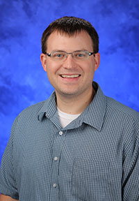 A head-and-shoulders professional photo of Mark Spangler